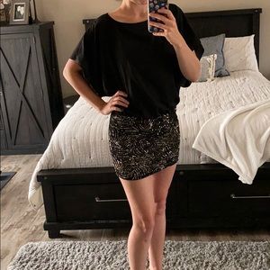 Black dress with sequin skirt